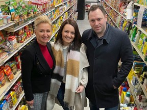 Victoria Bradbury, chair of BCBAC, with board members Stephanie Wood and James Niblock, delivering items to the Veterans Food Bank.