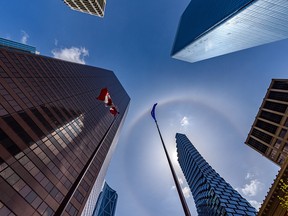 A halo around the sun shines above downtown Calgary's skyscrapers on June 5, 2020.