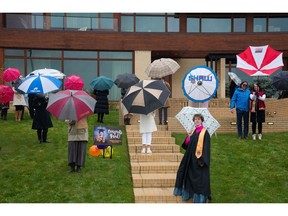 Rain or shine, family and friends still celebrated the graduation of Ann-Frances McCaig from  Calgary Academy, while  practicing physical distancing due to the pandemic.