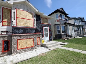 Damaged homes in Saddleridge in Calgary on Thursday, June 25, 2020.