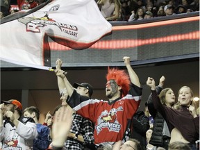Roughnecks fans celebrate a goal during the 2nd half of action as the Calgary Roughnecks beat New York Riptide 13-9 at the Saddledome.  Saturday, February 8, 2020. Brendan Miller/Postmedia