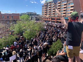 Anti-racism protesters gather near the 10th Street N.W. bridge at Kensington on Wednesday, June 3, 2020.