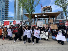 A crowd protests racism and police brutality in Calgary's East Village on Monday, June 1, 2020.