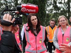Prime Minister Jacinda Ardern meets and talks to staff during the visit to Trevelyans Kiwifruit and Avocado Packhouse on June 09, 2020 in Tauranga, New Zealand.