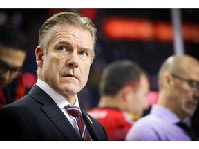 Calgary Flames interim head coach Geoff Ward on the bench during NHL action in Calgary on Thursday December 5, 2019. Al Charest/Postmedia