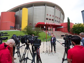 Rob Adamson, partner with DIALOG Architects, speaks about the design and construction of the $550-million Event Centre during a press conference outside the Scotiabank Saddledome on Wednesday, June 24, 2020.