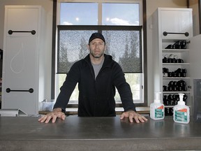 Matt Kinch, owner of The Sweat Lab, poses for a photo as Alberta is set to enter phase two of reopening the economy during the COVID-19 pandemic in Calgary. Wednesday, June 10, 2020.