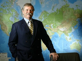 Charlie Fischer, president and CEO of Nexen Inc.  in his Calgary head office on Nov.  3, 2003. Fischer died on June 17, 2020 at the age of 70.