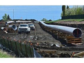 Trans Mountain pipeline expansion work is carried out in Edmonton. Canada needs a national infrastructure corridor more than ever, says former finance minister Ted Morton.