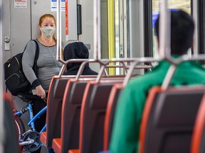 A passenger wears a mask on a CTrain on Wednesday, July 22, 2020.