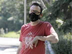 Bryson Montgomery poses for a photo near his home in southwest Calgary. Montgomery recently recovered after testing positive for COVD-19.