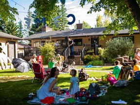 Lori Smith and her husband Greg Malazdrewicz held the Calgary Faux Festival in their Rosemont backyard with 20 of their folk festival friends. Performers included Jory Kinjo and Brent Tyler.