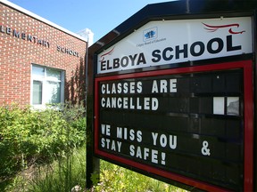 A sign is shown posted outside Elboya School School in the southwest Calgary on Tuesday, July 21, 2020.