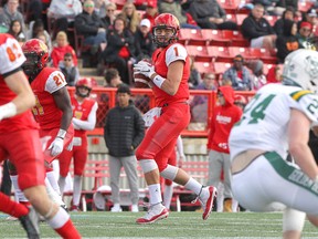 Dinos quarterback Josiah Joseph looks for an open man during the first half of action as the U of C Dinos played host to the U of A Golden Bears at McMahon Stadium on Saturday, October 5, 2019.