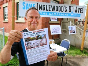 Phil Levson, President of the Inglewood Community Association, is talking with people outside their headquarters on 9th Ave SW. Levson is campaigning to stop high-rise buildings from being developed in the community Friday, July 10, 2020.