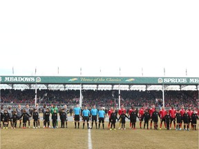 Teams Forge FC (L) and Cavalry FC are shown during the national anthem before kick off during leg 2 of the Canadian Premier League Championship between Forge FC and Cavalry FC at ATCO Field at Spruce Meadows in Calgary on Saturday, November 2, 2019. Forge won 1-0 and were crowned league champions. Jim Wells/Postmedia