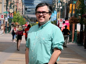 Paul Fairie poses for a photo along Stephen Ave. SW. on Friday, July 3, 2020.