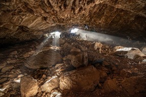 Researchers entering at a cave in Zacatecas in central Mexico, which contained stone tools and other evidence of the presence of prehistoric human populations, are seen in this image released on July 22, 2020.