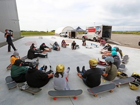 Kids talk with leaders during a Nations Skate Youth event at the Seven Chiefs Sportsplex on the Tsuut'ina Nation, Tuesday, July 21, 2020.