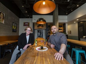 Manager Cailin Walsh and chef Zoltan Csiki pose for a photo in the newly opened Soleil Bistro & Bar in East Village. Azin Ghaffari/Postmedia