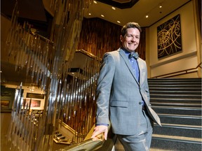 Nicholas Bell, president and CEO of the Glenbow Museum, poses in the main staircase on Oct. 30, 2019.