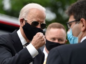 Democratic presidential candidate and former U.S. Vice President Joe Biden gestures while speaking to people at the Delaware Memorial Bridge Veteran's Memorial Park in New Castle, Delaware, May 25, 2020.