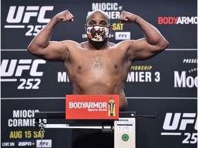 LAS VEGAS, NEVADA - AUGUST 14: In this handout image provided by UFC, Daniel Cormier poses on the scale during the UFC 252 weigh-in at UFC APEX on August 14, 2020 in Las Vegas, Nevada.