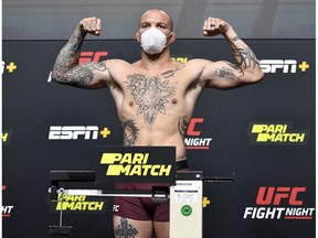LAS VEGAS, NEVADA - AUGUST 28: In this handout image provided by UFC, Anthony Smith poses on the scale during the UFC Fight Night weigh-in at UFC APEX on August 28, 2020 in Las Vegas, Nevada.