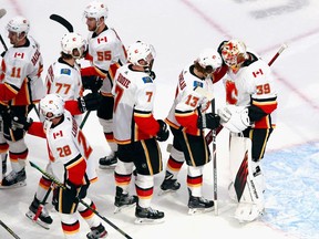 EDMONTON, ALBERTA - AUGUST 11: The Calgary Flames celebrate their 3-2 victory over the Dallas Stars in Game One of the Western Conference First Round during the 2020 NHL Stanley Cup Playoffs at Rogers Place on August 11, 2020 in Edmonton, Alberta, Canada.