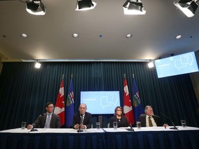 (L-R) Doug Schweitzer, Minister of Justice and Solicitor General, Jason Luan, Associate Minister of Mental Health, Geri Bemister-Williams, vice-chair, Supervised Consumption Services Review Committee and Rod Knecht, chair, Supervised Consumption Services Review Committee are shown as the Government of Alberta released a report on safe consumption sites in Alberta during a press conference in Calgary on Thursday, March 5, 2020.