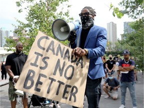 Hundreds came out for the Black Lives Matter, Above the Law Protest, The story of Godfred Addai, where they gathered at the Kensington bridge and marched to the Calgary Courts and ended at City Hall in Calgary on Thursday, August 6, 2020.