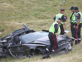 Calgary police investigate the scene of a serious car accident near Stoney Trail and McKnight Blvd. N.E. on Thursday, Aug. 20, 2020.