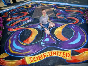 Artist Mike Hooves poses with his mural Lone United during the unveiling of public art by LGBTQ+ artists in Central Memorial Park on Friday, Aug. 28, 2020.