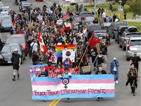 Hundreds came out to march in the Defund the Police national protest along with Black Trans Lives Matter and DefundYYC, with the support of Idle No More through downtown Calgary on Saturday, August 29, 2020.