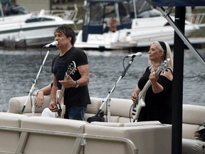 Canadian new-wave rockers The Spoons led a group of musicians performing from a pontoon boat in the waterways of Bobcaygeon, part of a project that aims to heal people and communities through music. Bobcaygeon has been particularly hard hit by COVID-19.