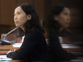 CP-Web.  Chief Public Health Officer Dr. Theresa Tam is reflected in a television during a news conference in Ottawa, Friday, Aug. 14, 2020.