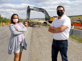 Residents L-R, Suzette Pereira and Mathieu Cousineau who live near 85 Str. and Lower Springbank road have had enough of the dust and noise as construction on the ring road has kicked into overdrive in Calgary on Thursday, August 27, 2020.