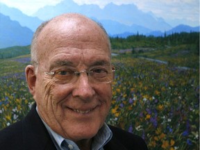 Jock Osler is pictured at his northwest Calgary home with a painting by Canadian artist Randolph Parker, Friday Oct. 16, 2009.