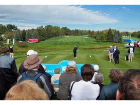 Fans watch as players tee off on the first hole in Round 1 of the Shaw Charity Classic at the Canyon Meadows Golf Club in Calgary on Friday September 2, 2016. Gavin Young/Postmedia