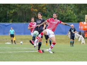 Marcus Haber of Cavalry FC reaches for the ball in a 2-1 loss to Pacific FC at The Island Games in P.E.I.