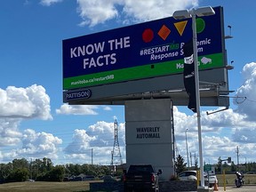 A billboard advertises information about COVID-19 in Winnipeg on Aug. 28, 2020.