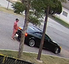 Police are looking for the black Infiniti two-door coupe and the person pictured in this photo in relation to a fatal double shooting on Aug. 28.