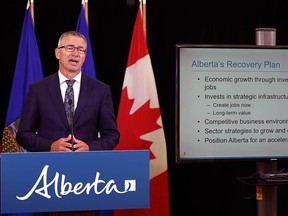 Alberta Finance Minister Travis Toews presents the province's first quarter fiscal update on Aug. 27, 2020. Alberta’s deficit is forecast to hit $24.2 billion in the wake of the COVID-19 economic fallout.