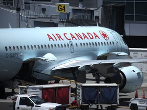 An Air Canada plane sits parked at the gate at San Francisco International Airport on June 30, 2020 in San Francisco, California.