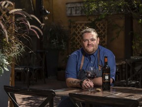 Chef Christopher Hyde enjoys the patio at Bonterra Trattoria in the Beltline. Azin Ghaffari/Postmedia