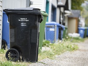 Pictured is a black bin used for garbage collection in a back alley in the community of Sunnyside on Monday, September 14, 2020.