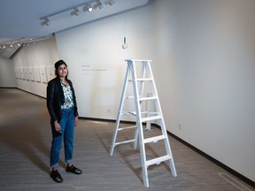 Curator Kanaka Anand stands next to Yoko Ono's 1966 piece entitled Ceiling Painting/Yes Painting featured in the Yoko Ono: Growing Freedom exhibition running Sept. 17, 2020 to Jan. 31, 2021 at Contemporary Calgary.  Gavin Young/Postmedia