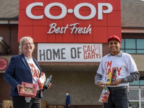 Chris Gruber, private brands senior director, left, and Ken Keelor, CEO of Calgary Co-op, pose for a photo at the launching event of their Calgary-centric private brands, Cal & Gary’s and Founders & Farmers, at their Macleod Trail location on Thursday, September 17, 2020.