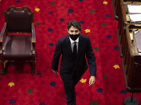 Prime Minister Justin Trudeau heads back to his seat before the delivery of the Speech from the Throne at the Senate of Canada Building in Ottawa, on Wednesday, Sept. 23, 2020.