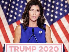 Kristi Noem, governor of South Dakota, speaks during the Republican National Convention seen on a laptop computer in Tiskilwa, Illinois, U.S., on Wednesday, Aug. 26, 2020.